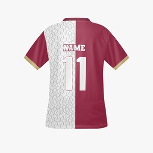 May include: Maroon and white short-sleeved jersey with gold trim. The jersey displays the number 11 in white and the word "NAME" above it. The left side of the jersey has a white pattern, while the right side is solid maroon.