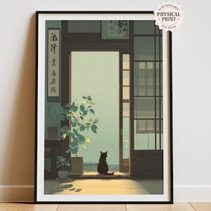 May include: A framed art print depicting a serene interior scene. A black cat sits in a doorway, looking out at a rainy landscape. The room features potted plants and traditional Japanese architectural elements. The print includes text in the upper right corner.