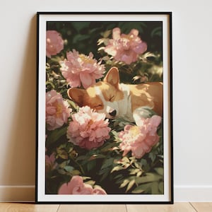 Puede incluir: Una impresión enmarcada que presenta un perro corgi durmiendo entre exuberantes peonías rosas. El perro tiene un pelaje marrón y blanco, y las flores están en plena floración. La obra de arte está ambientada sobre un fondo de follaje verde.