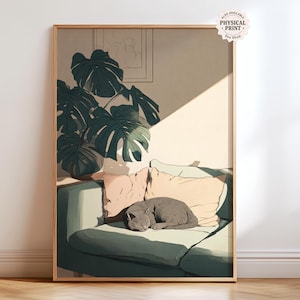 May include: A framed art print depicts a serene indoor scene. A gray cat sleeps on a green sofa, with pink and yellow pillows. A large potted plant with green leaves sits nearby. The artwork is in a wooden frame.