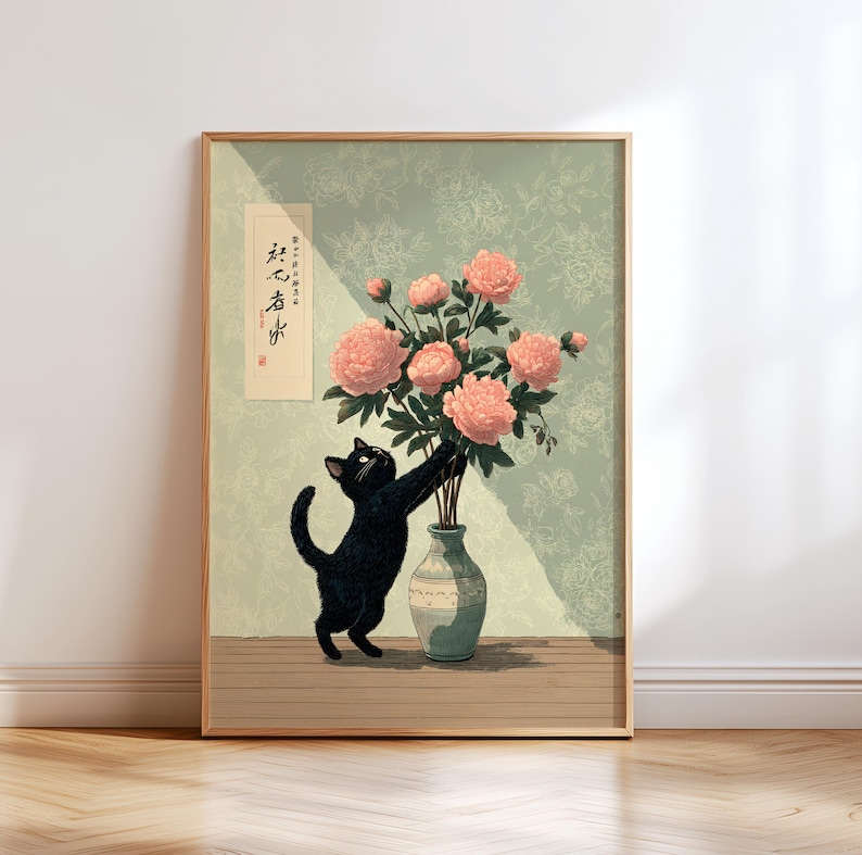 May include: A framed art print featuring a black cat reaching for pink peonies in a vase. The artwork has a vintage aesthetic with a light green floral patterned background and a wooden frame. Japanese text is visible on the left.