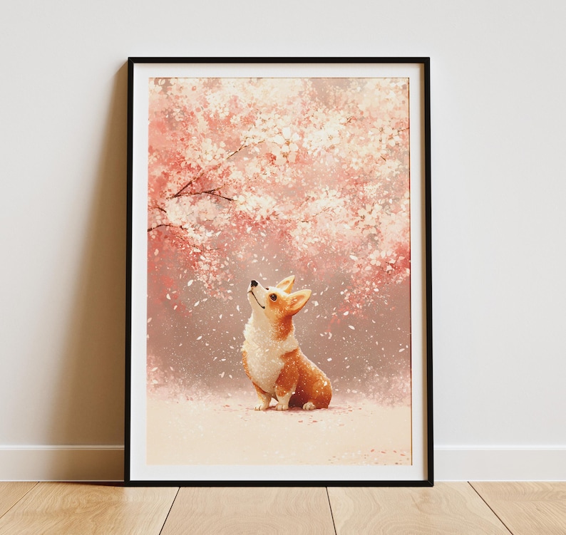 Puede incluir: Una impresi&oacute;n art&iacute;stica enmarcada que presenta un perro corgi mirando hacia arriba a un cerezo en flor. La obra de arte tiene un estilo suave y pict&oacute;rico con una paleta de colores rosa, blanco y marr&oacute;n. El corgi es marr&oacute;n y blanco.