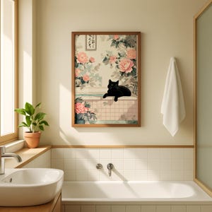 May include: A framed art print featuring a black cat lounging in a bathtub scene with floral wallpaper and pink flowers. The artwork has a vintage aesthetic, with a wooden frame and a serene, domestic theme.