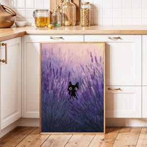 May include: A framed print depicting a black cat amongst purple lavender. The artwork has a soft, painterly style with a warm, golden frame. The background is a gradient of pink and yellow, creating a serene atmosphere.