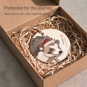 Personalized hedgehog Christmas ornament protected inside a kraft box with paper filling, ready for careful shipping after design approval.