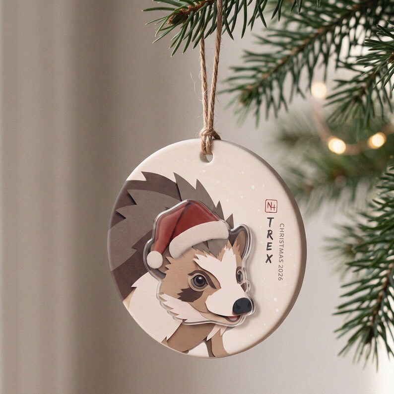 Personalized hedgehog Christmas ornament displayed in a calm, warmly lit holiday setting with the portrait clearly visible.
