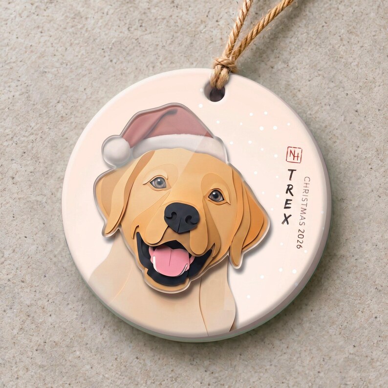Personalized dog Christmas ornament featuring a golden Labrador named TREX, with a 3.5 mm ceramic base and a 3 mm clear acrylic head-and-Santa-hat layer.