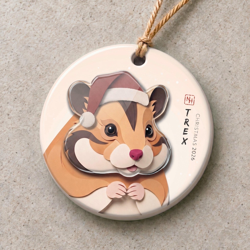 Personalized hamster Christmas ornament with a 3.5 mm matte ceramic base and a separate 3 mm clear acrylic portrait-and-Santa-hat layer.