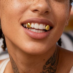 Enkeltands Silver Cap Grillz 14K Guldpläterad Anpassad Hiphop Tandsmycken Iced Out Fang Rap Style Accessoar Enkelt Cap Bling Tandskydd
