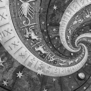 May include: Black and white image of a spiral astronomical clock face. The clock face features Roman numerals, zodiac symbols, and star-shaped accents. The design has a detailed, textured appearance, with a celestial theme.