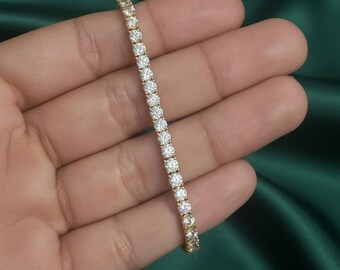 Pulseira de tênis redonda com diamantes/moissanita, banhada a ouro amarelo 14K e feita à mão em prata.