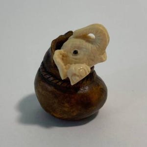 Charming Elephant Mammoth Tusk In Bag Figurine