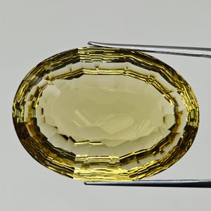 67·80 carat Natural Lemon Quartz Gemstone – oval Cut, Large Collector’s Gem 34.22x24.94mm,  13.57 mm Height, Faceted Yellow Quartz.