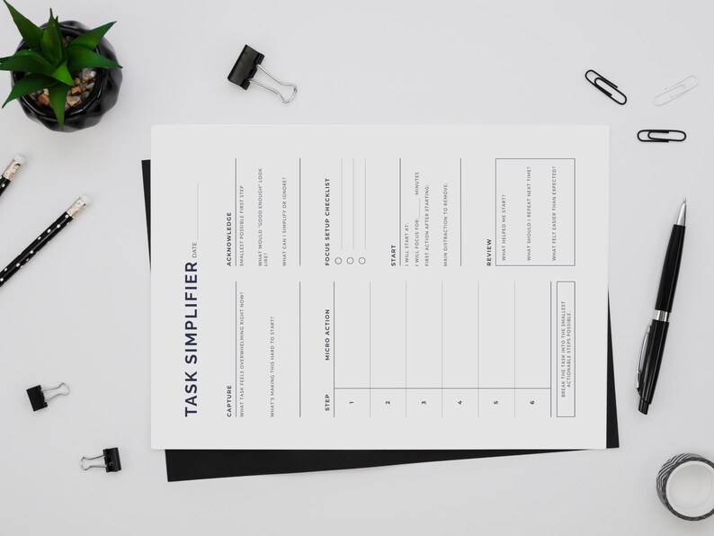 Minimalist Task Simplifier printable on clean desk — procrastination planner and task breakdown worksheet for professionals, students, and entrepreneurs who feel paralysed by overwhelming tasks. Built around the Momentum Loop: Capture, Acknowledge, Progress, Reinforce, and Reflect. Break any task into micro-actions, build momentum with quick wins, and commit to a clear first step. Instant digital download PDF and PNG, US Letter and A4, portrait layout. Designed by NotivoCo, Canada.