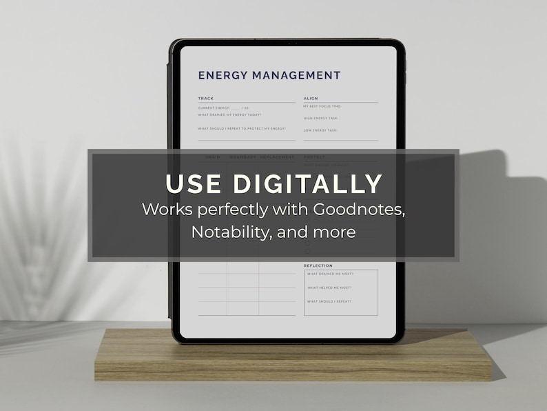May include: A digital energy management planner displayed on a black tablet. The screen shows a template with sections for tracking energy levels and reflection. The text "USE DIGITALLY" is overlaid on the image, with the text "Works perfectly with Goodnotes, Notability, and more".