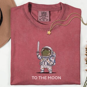 To The Moon Astronaut Frog Graphic Shirt, Funny Space Exploration Tee, NASA Artemis 2 Moon 2026 Humor Gift For Astronomy And Animal Lover image 4