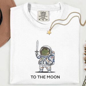 To The Moon Astronaut Frog Graphic Shirt, Funny Space Exploration Tee, NASA Artemis 2 Moon 2026 Humor Gift For Astronomy And Animal Lover image 6