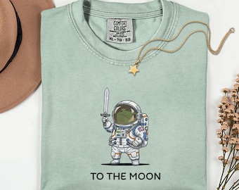To The Moon astronaut Frog grafisch shirt, grappig ruimteverkenningsshirt, NASA Artemis 2 Moon 2026 humor cadeau voor astronomie en dierenliefhebber