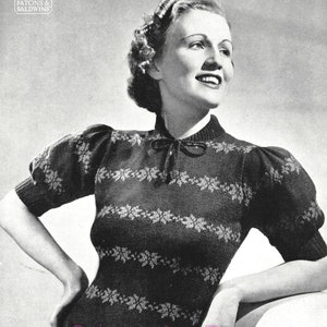 May include: A black and white photo of a woman wearing a knitted sweater with a fair isle pattern. The sweater has a high neckline and short sleeves. The text "LADY'S FAIR ISLE JUMPER - "BERNICE" DESIGN." is printed below the image. The text "Instructions on page 17." is printed below the sweater name. The text "PATON'S SUPER SCOTCH FINGERING WOOL, 3-ply." is printed below the instructions.
