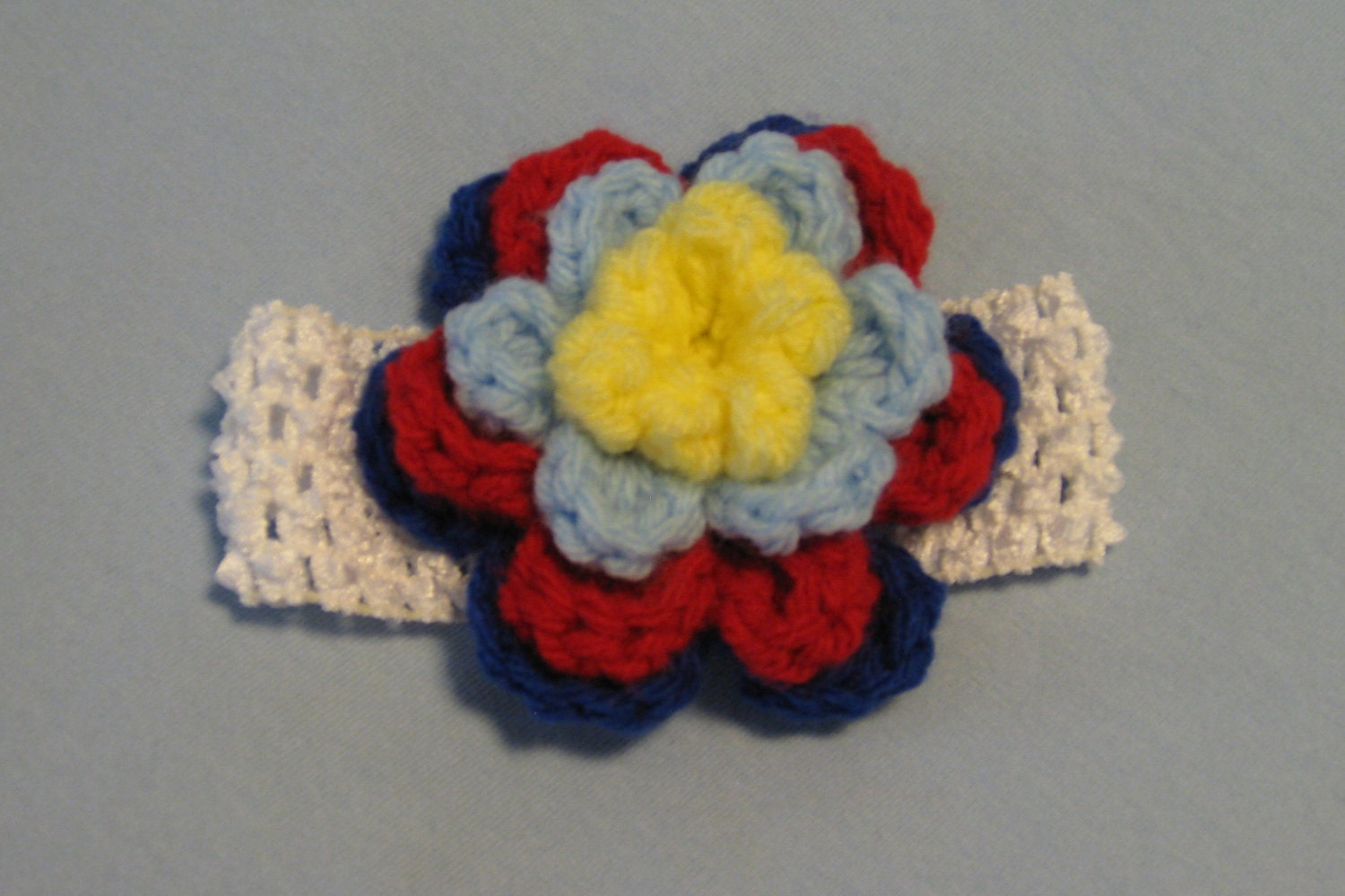 White baby head wrap with intricate crocheted flower in Autism Etsy
