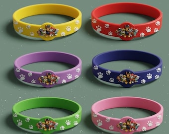 May include: Six colorful silicone bracelets featuring a cartoon character design. Each bracelet is a different color: yellow, red, purple, blue, green, and pink. The bracelets have a paw print pattern and a central character emblem.