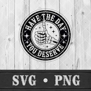 May include: A monochrome graphic featuring a skeleton hand giving a thumbs up, encircled by the text "HAVE THE DAY YOU DESERVE". The design includes star accents and is suitable for SVG and PNG formats.