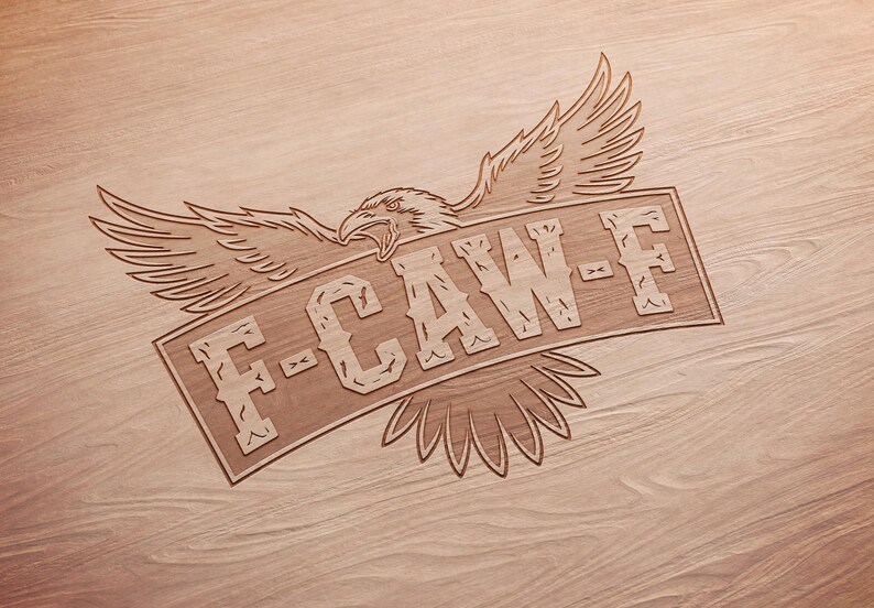 May include: A wooden carving featuring an eagle with outstretched wings and the text "F-CAW-F" on a banner. The design is etched into a light brown wooden surface, showcasing the grain.