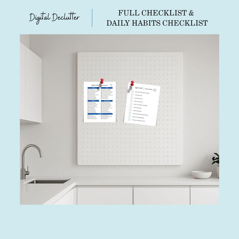 May include: A white pegboard with two sheets of paper pinned to it. One sheet is a full checklist with blue headings and text. The other is a daily habits checklist. The text "Digital Declutter" and "FULL CHECKLIST & DAILY HABITS CHECKLIST" are visible.