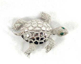 Monet Silver Tone Sea Turtle Brooch with Emerald Green Rhinestone Eyes