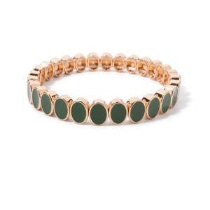 May include: A circular stretch bracelet featuring a series of connected rose gold-toned metal oval links. Each link is inlaid with a smooth, dark forest green enamel centre, creating a repeating pattern around the entire circumference of the jewellery.