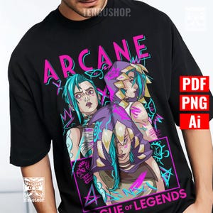 May include: Black t-shirt with a graphic from the animated series "Arcane". The design shows three characters with blue and purple hair, set against a neon pink and teal background. The text "Arcane" and "League of Legends" are also visible.