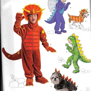 May include: A Simplicity sewing pattern for children's dinosaur costumes. The pattern includes a triceratops, a dragon, and a stegosaurus. The pattern is for sizes UK 3-8.