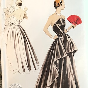 May include: Vintage Vogue sewing pattern reproduction for a black strapless gown with a ruffled skirt. The pattern is for a 1948 design and includes additional size options and cutting layouts.