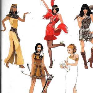 May include: Simplicity sewing pattern number 1770 K5 for five different costumes: an Egyptian queen, a flapper, a cavewoman, a Native American, and a Greek goddess. The pattern includes instructions for sizes US 8-16, EU 34-42, and FR 36-44.