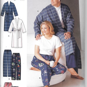 May include: A sewing pattern for two sleepwear garments. The pattern includes a long robe with a plaid design, a long robe with a white design, a pair of plaid pajama pants, a pair of pajama pants with a colorful design, a pair of red and white pajama shorts, and a pair of striped pajama shorts. The pattern is for sizes S-L.