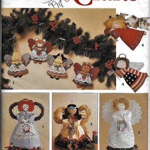 May include: A Simplicity Crafts pattern for making five different angel ornaments. The pattern includes instructions for making a red angel, a white angel, a Native American angel, a red and white angel, and a cow angel. The pattern also includes instructions for making a wreath with the angels.