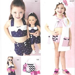 Puede incluir: Un patrón de costura para un traje de baño para niña y un traje de baño para muñeca a juego. El patrón incluye una parte superior blanca con lunares rosas, una parte inferior a rayas rosas y blancas, una bata blanca y una diadema blanca con una flor rosa. El traje de baño para muñeca es una parte superior a rayas azules y blancas con un lazo blanco y una parte inferior a rayas azules y blancas. El patrón es de Ruby Jean's Closet y está diseñado e impreso en los Estados Unidos.