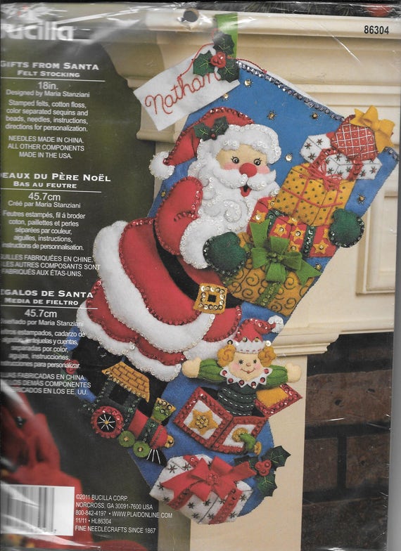 Christmas tree with gifts and santa maria Christmas tree with gifts and santa maria