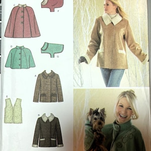 May include: Simplicity sewing pattern featuring various coat and cape designs. The pattern includes illustrations of different styles, including a pink cape, a green cape, and a brown coat. The image also shows a woman wearing a coat and a cape.
