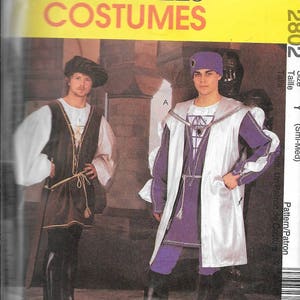 May include: McCall's Costumes pattern showing two medieval outfits. One is a brown and gold tunic with a matching hat. The other is a purple and silver ensemble with a long coat and hat. The pattern size is Y (Sml-Med).