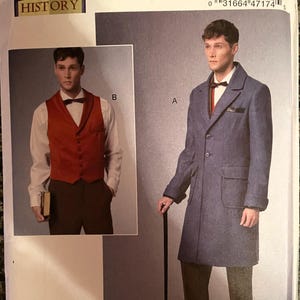May include: Butterick sewing pattern B6502 featuring a man in a long blue coat and a red vest with a bow tie. The pattern includes a barcode and the words "MAKING HISTORY".