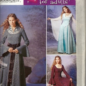 Peut inclure: Un patron de couture pour un costume adulte. Le patron comprend trois styles de robes différents : une robe bleue avec un col blanc, une robe bleu clair avec une superposition blanche et une robe bordeaux avec un corsage à lacets. Le patron est de Simplicity et est pour adultes.