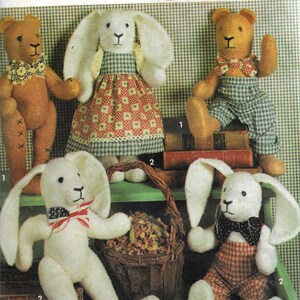 May include: A Simplicity Crafts pattern for making four stuffed toys: a bunny wearing a red and white gingham dress, a bunny wearing a red and white gingham overall, a teddy bear wearing a blue and white gingham overall, and a teddy bear wearing a brown bow tie. The pattern number is 7858.