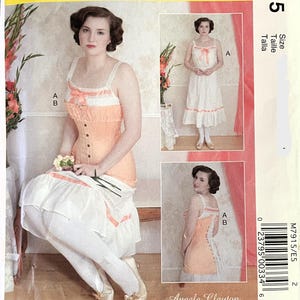 May include: McCall's Costumes pattern M7915 featuring vintage-style dresses. The main image shows a woman in a peach corset and white skirt. Additional images display different dress variations. The pattern includes the text "Angela Clayton".