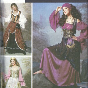 May include: A sewing pattern for three different costumes. The first costume is a red and black pirate costume with a white blouse. The second costume is a purple and black pirate costume with a gold belt. The third costume is a pink and white princess costume with a gold belt. The pattern is from Simplicity Costumes.