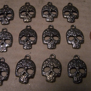 Day of the Dead Lot of 12 Dark Gray Textured Sugar Skull Charms - Mexico