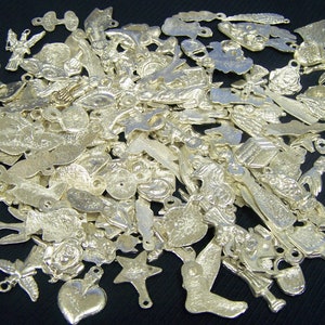 Lot of 50 Assorted Shiny Silver-Colored Milagros, Mexico