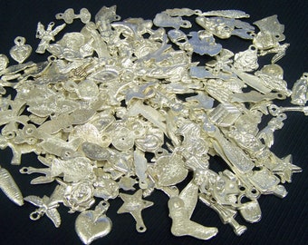 Lot of 100 Assorted Shiny Silver-Colored Milagros, Mexico