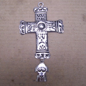 Tin Cross with Dangling Female Torso Milagro