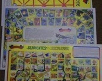 May include: Three game boards for a board game called "El Coyote". The boards are yellow with red lines and feature images of animals and landscapes. The game boards are titled "El Coyote", "Sorpresas y Descuidos", and "Juega y Gana".